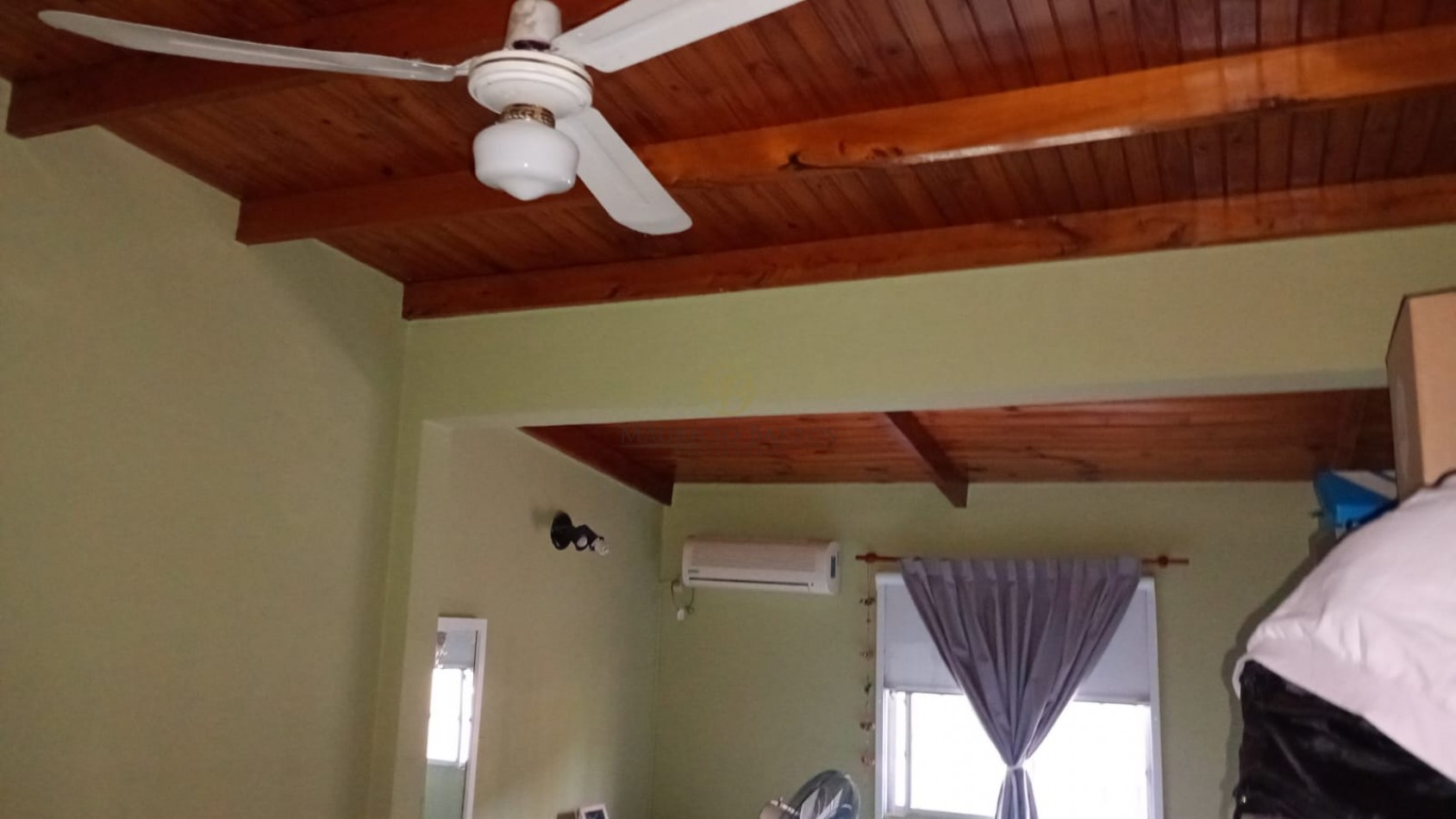 Casa de 2 dormitorios, garaje y quincho.